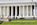 View of the eastern facade of the historic Abraham Lincoln Memorial with it's surrounding grounds filled with tourists