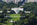 Grand aerial view of the President's House, The White House including the South Lawn & South Fountain