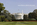 Iconic view of the South Portico & South Lawn of the White House from Executive Avenue, Washington DC