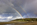 Striking view of a partial double rainbow above Llanddona Beach, Red Wharf Bay, Anglesey, North Wales