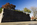 Late autumn scene from third open-air room of the presidential memorial, featuring a red South Dakota granite wall, Franklin D. Roosevelt Memorial, National Mall, Washington DC