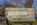 Autumn view of the official signage on exit or entry into the Fourth Term Room of the open-air presidential memorial in West Potomac Park, Washington DC