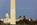 View of the bottom-section of the Washington Monument including the fifty American flagpoles encircling the national monuments plaza, The Mall, Washington DC