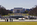 A spring scene from Washington DC, featuring a view into America's Front Yard including the World War Two Memorial, tourist crowds and Abraham Lincoln Memorial