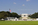 A summer scene from Washington DC, featuring a view into America's Front Yard including the World War II Memorial, Reflecting Pool and Lincoln Memorial