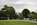 A summer scene from a vantage point in Arlington National Cemetery looking towards the capital city of Washington in the distance