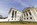 City of Richmond scene featuring the Palladian style Virginia State Capitol Building front perched atop Shockoe Hill overlooking the James River