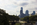 Rocky Steps scene featuring Eakins Oval and the George Washington Statue including the tree-lined boulevard of the Benjamin Franklin Parkway and Philadelphia skyline