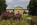 Vibrant summer scene from the Benjamin Franklin Parkway featuring the tree-lined avenue including the Beaux-Arts portico of the Philadelphia Museum fronted by the Washington Monument at Eakins Oval 
