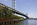 Waterfront scene featuring the Benjamin Franklin Bridge spanning the Delware River, Society Hill and Penn's Landing, Philadelphia