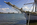 Penn's Landing scene from the three-masted barkentine Gazela looking across the Delaware River towards the USS New Jersey docked at Camden Waterfront, Philadelphia