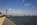 Waterfront scene featuring a view of the Benjamin Franklin Bridge spanning the Delaware River from Penn's Landing, Philadelphia