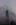 An eerie and jaw-dropping scene from the Hudson River featuring the One World Trade Center partially obscured by dense mist, Manhattan, New York City