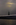 A unique New York Harbor scene featuring a view of the partially obscured Statue of Liberty presiding over New York Harbor in misty weather, New York City
