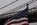 Patriotic East River scene featuring the historic Brooklyn Bridge in misty weather, New York City