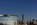 New York City Lower Manhattan skyline scene featuring the iconic One World Trade Center skyscraper and Liberty National Golf Course clubhouse, Hudson River Waterfront Walk, New Jersey