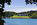 Beautiful view from across the menai Strait on mainland North Wales looking towards the neoclassical and gothic stone edifice of Plas Newydd country house and it's surrounding grounds