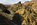 Opencast mining scene featuring a footbridge along the copper mine trail at Parys Mountain, Amlwch, Anglesey, Gwynedd