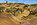 View of the lunar-looking landscape created by extensive opencast copper mining at Parys Mountain, featuring the Grade II Listed windmill in the background, Amlwch, Anglesey, North Wales