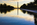 One of the views of the National Mall, featuring America's Front Yard at sunrise, featuring the Reflecting Pool, Elm Walk and the Washington Monument, District of Columbia