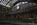 St Pancras railway station upper concourse scene featuring public art Chromolocomotion, the meeting place statue and Dent clock, London, England
