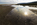 Red Wharf Bay beachscape, seascape and cloudscape reflection featuring the headland at Llanddona and salt marsh, Isle of Anglesey, Gwynedd
