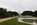 Summer scene from Lower Senate Park featuring the Reflecting Pool, Upper Senate Park & central fountain including the US Capitol Building in the distance, Capitol Grounds, The Hill, Washington DC