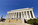 One of the views of the Abraham Lincoln Memorial featuring the ceremonial Lincoln Steps, Doric colonnaded eastern exterior and peak hours tourism crowds, District of Columbia
