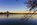 A spring daybreak view from the National Mall in Washington DC, featuring a scene from the Tidal Basin including the Thomas Jefferson Memorial and famed Yoshino cherry blossoms
