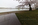 A early morning spring Tidal Basin scene in misty weather featuring the cherry blossoms in peak bloom and the Jefferson Memorial in the distance, District of Columbia