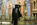 Upper concourse nightography from St Pancras International train terminal featuring the statue of John Betjeman, London, England