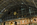 Upper concourse nightography from St Pancras International railway station featuring the roof structure, Dent Clock & Lovers Statue, London, England