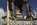 Albert Memorial scene featuring the Prince Albert Statue housed inside the Gothic ciborium including a section of the extenstive and detailed frieze of Parnassus, Kensington Gardens, London, England
