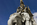 Albert Memorial scene featuring the Asia Group Statue by John Henry Foley including the intricately decorated spire of the national memorial behind, Royal London, Engalnd