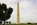 Summer scene featuring the prominent location of the Washington Monument perched atop the monument mound or the knoll, National Mall, Washington DC