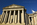 Streetview of the Classical Revial portico of the Andrew W. Mellon Auditorium featuring a large pediment titled "Columbia", the building also connects two wings of the William Jefferson Clinton Federal Building, Washington DC
