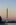 Unique nightography scene from the Reflecting Pool walkway featuring a full-moon and the Washington Monument towering above the capital city, America's front yard, Washington DC