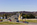 Spring view featuring the ceremonial gateway into Washington DC, including the Arts of War: Sacrifice and Valor sculptures and Arlington Memorial Bridge, Washington DC