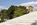 Unique scene from the ceremonial-like Watergate Steps, featuring the bronze Arts of War sculpture "Music and Harvest", Arlington Memorial Bridge and complex, Washington DC