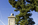 Bridge scene featuring one of the western towers of Arlington Memorial Bridge mounted by a eagle sculpture, architectural detail, bridge complex, Virginia-side