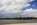 A late summer scene from the Potomac River Tidal Basin featuring America's national monument and symbol in the distance, West Potoamc Park, Washington DC