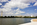 A summer Tidal Basin scene featuring America's national monument and the tip of the Capitol Dome in the distance, National Mall, Washington DC