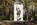 Theodore Roosevelt Island Memorial Plaza scene featuring the bronze Teddy Roosevelt Statue in a specch pose backed by a granite monolith, Washington DC