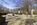 Theodore Roosevelt Memorial Plaza scene featuring the bronze Teddy Roosevelt Statue and granite monoliths, Roosevelt Island, George Washington Memorial Parkway, District of Columbia