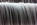 Close-up of the water crashing down to the bottom of a man-made waterfall within the mammoth open-air rooms at the Franklin Delano Roosevelt Memorial, Tidal Basin, West Potomac Park