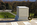 Autumn scene from the Tomb of the Unknown Soldier including the white marble sarcophagus above which is perched atop the Monumental Steps outside the Memorial Amphitheater at Arlington National Cemetery, Virginia
