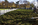 Late fall scene featuring the Triangular Field of Service occupied by stainless steel statues depicting a squad on patrol during the Korean conflict, Korean War Veterans Memorial, Washington DC