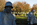 Autumn scene featuring a larger than life size stainless steel statue in the Triangular Field of Service at the Korean Veterans Memorial, Independence Avenue SW, District of Columbia