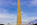 Beautiful evening view of the sun shining on the surface of the Washington Monument encircled by fifty America flagpoles, The Mall, DC