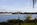 Late fall scene from the banks of the Potomac River featuring the Lincoln Memorial, Arlington Memorial Bridge, Watergate Steps and America's national monument, Mount Vernon Trail, District of Columbia